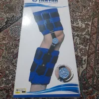 زانو بند مدرج و عصا