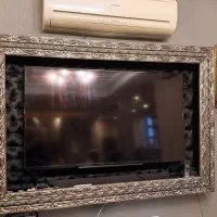 قاب تلویزیون دیواری ست با قاب پرده