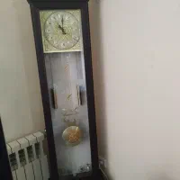 ساعت ایستاده سالم و قاب عکس