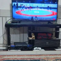 میزتلویزیون شیشه ای