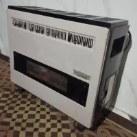 بخاری و میز تلویزیون کاملا سالم فروش بقیمت مناسب