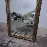 آیینه خیلی بزرگ دور قاب