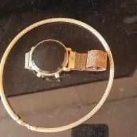 ساعت و گردنبند