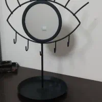 یک عدد آیینه طراحی زیبا موجه ای مخصوص میز آرایش