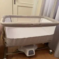 تخت کنار مادر کیدیلو برقی