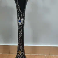 یه عدد گلدان شیشه ای