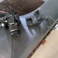 دوربین عکاسی وفیلم برداری کنونEOS1100D|دوربین عکاسی و فیلم‌برداری|پرند, فاز ۲|دیوار