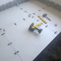 شاگرد سنگ کار کاشی‌کاری