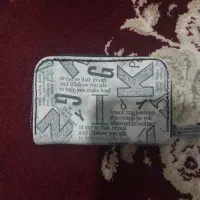 کیف مدارک گمشده به رنگ توسی به این شکل