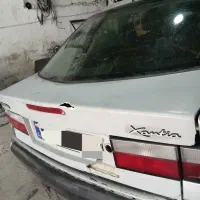 صندوق با شیشه کامل و در عقب سمت راننده زانتیا