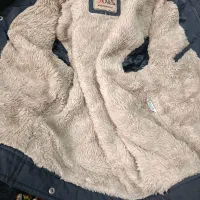 کاپشن استوک کلمبیا داخل پشم روی شمعی آب گریز