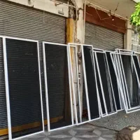 ساخت انواع کمد و کابینت و نصب شیشه های ساختمانی