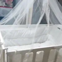 گهواره کنار مادر