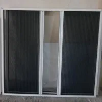 تولید و تعمیر انواع توری پلیسه و ثابت درب و پنجره.|خدمات پیشه و مهارت|فردیس, ثابتی|دیوار