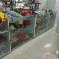 حراج مغازه پوشاک زنانه بچگانه .لوازم آرایشی. شال|لباس|خوی, |دیوار