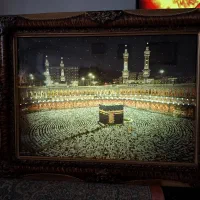 قاب عکس دیواری سالم و تمیز چراغ دار