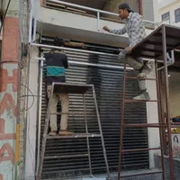 تعمیردرب شیشه ای اتومات.کرکره برقی.جک درب پارکینگ