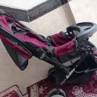 کالسکه و پیراهن بچگانه