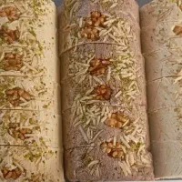 پخش انواع حلوا شکری شکلاتی رولتی و گردویی