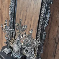 آینه و کنسول با جاشمعی و ساعت