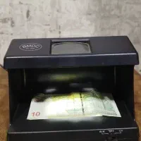 دستگاه تشخیص اسکناس تقلبی