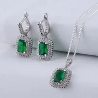 نیم ست نقره زبرجد آغوش بدون اجرت بال دار۶۵۴۰