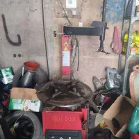 استادکاروکارگرساده تعویض لاستیک  ماشین سواری