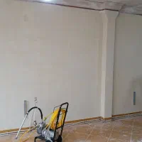 نقاشی ساختمان  با دستگاه ایرلس و سنباده برقی