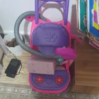 کالسکه وتعدادی عروسک دخترانه