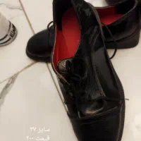 کفش|کیف، کفش، کمربند|بومهن, |دیوار