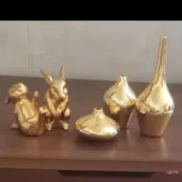 دکوری گلدان سالونگ مجسمه طلایی