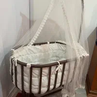 تخت گهواره ای نوزاد