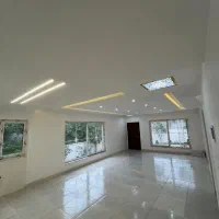 طراحی شیک ـ نمایی از جنس سنگ با محوطه سرسبز و جذاب|فروش خانه و ویلا|خشکبیجار, |دیوار