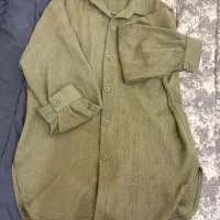 تعدادی شومیز و مانتو