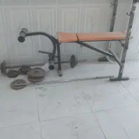 فروش میز پرس بدنسازی همراه دو هالتر و وزنه