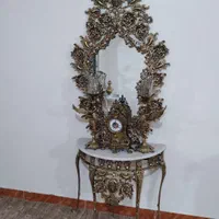 آینه و شعمدان وساعت