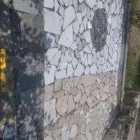 اجرای استخر،سنگ لاشه،تاوه،سنگ نما،موزاییک کاری