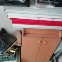 قفسه فلزی مغازه همراه با ستون و اتاق پرو سیار