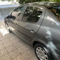 پژو ۲۰۶ صندوقدار V8 نوک مدادی ۹۸ بی رنگ|خودرو سواری و وانت|تهران, باغ فیض|دیوار