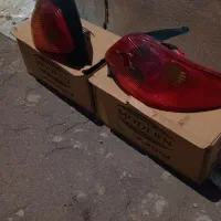 چراغ عقب ۲۰۶اصل فرانسه و نمد داشبورد ۲۰۶ وقفل