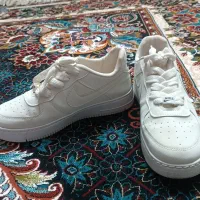 کفش نو|کیف، کفش، کمربند|نیشابور, خط کاشمر|دیوار