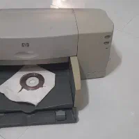 تعدادی لوازم اداری شامل پرینتر و فکس و اسکنر..