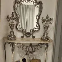 اینه و شمعدان برنجی