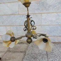 ساعت و لوستر طرح برنجی هردوباهم