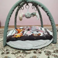 گهواره و تشک بازی نوزاد