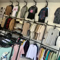 فروش یکجا پوشاک مردانه همراه دکور و ویترین
