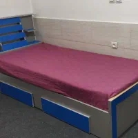 تخت یکنفره دارای دو کشو