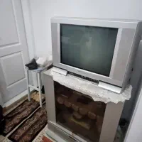 تلویزیون رنگی ۲۱اینچ و میز تلویزیون