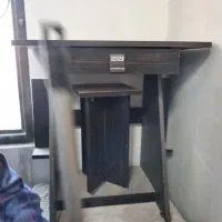 زیر چرخ خیاطی یا میز تحریر