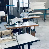 نیرو کار خیاط خانم در کارگاه تولیدی گونی برنج